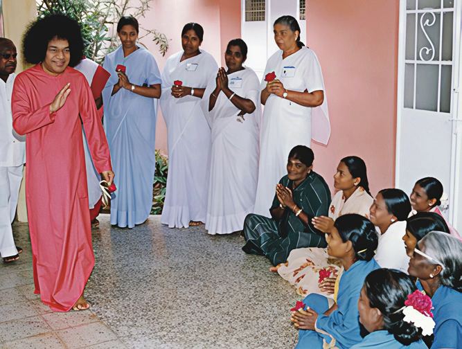 Swami blessing House Keeping staff