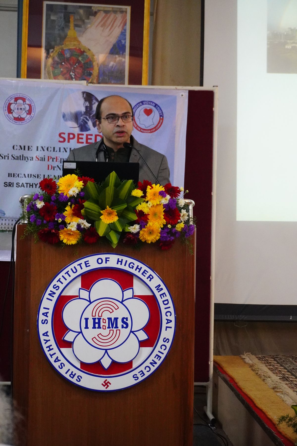SPEED 2025 speaker at the lectern