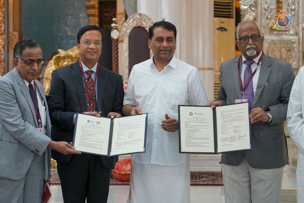Offering of MoU to Bhagawan