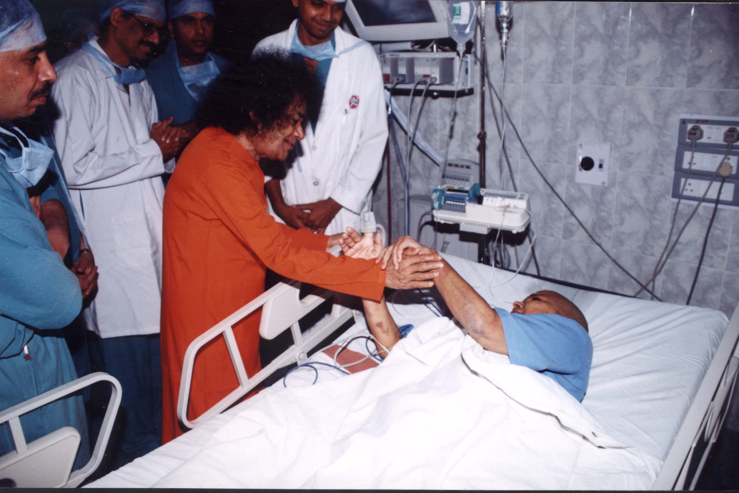 Swami blessing a patient