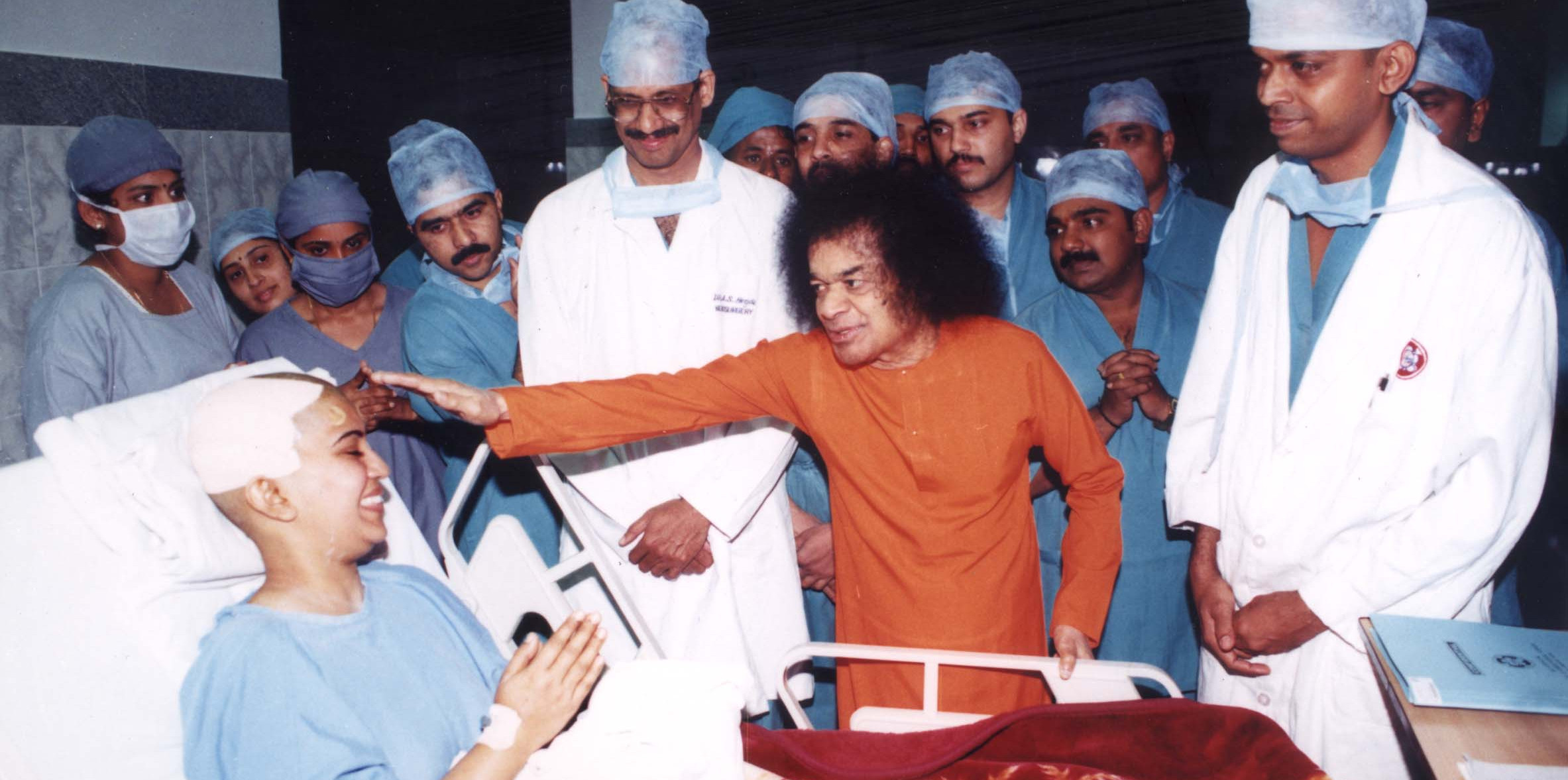 Swami blessing Neuro Patient