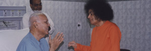 Swami blessing a cardiac patient
