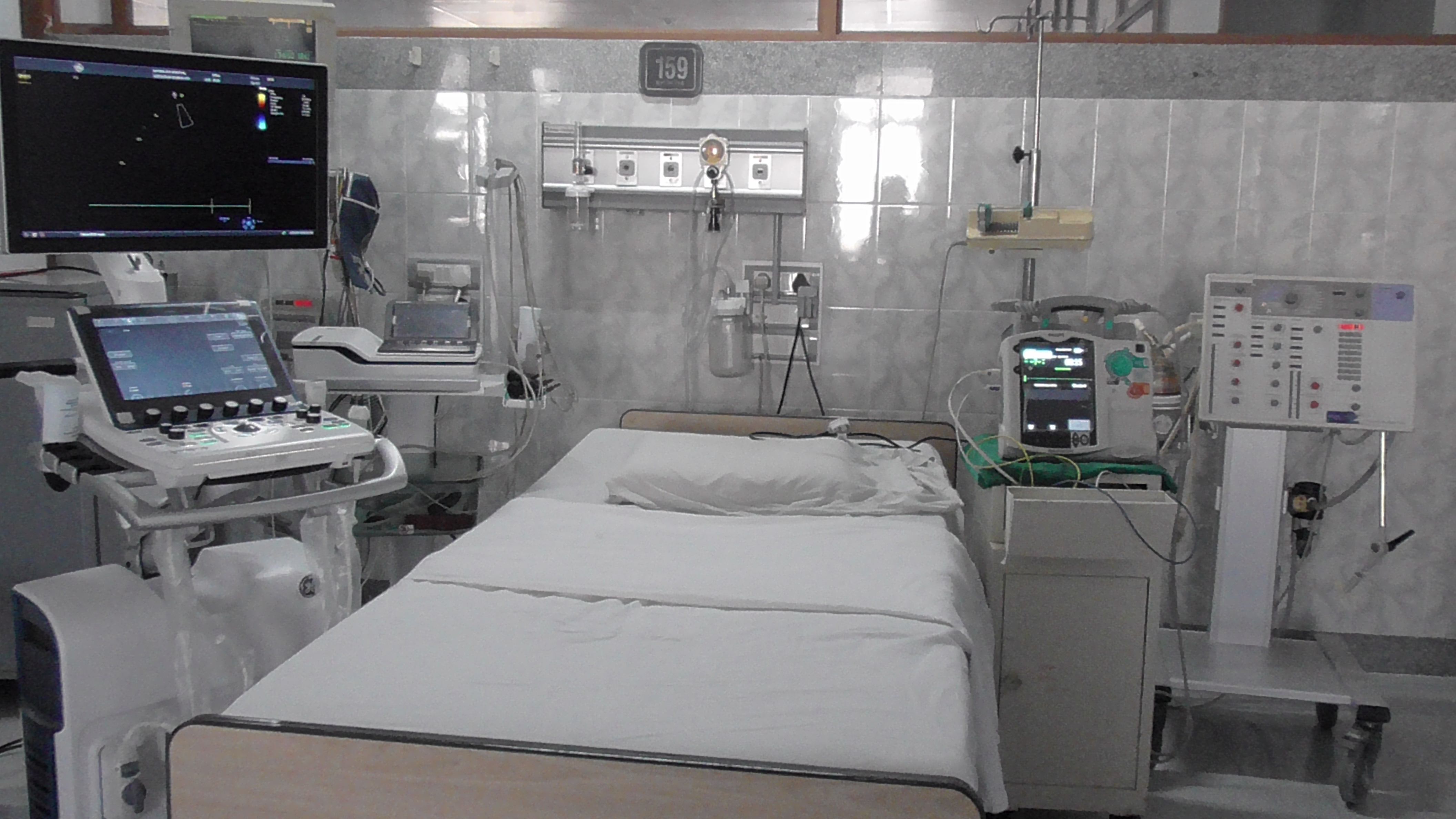 CCU bed with equipment