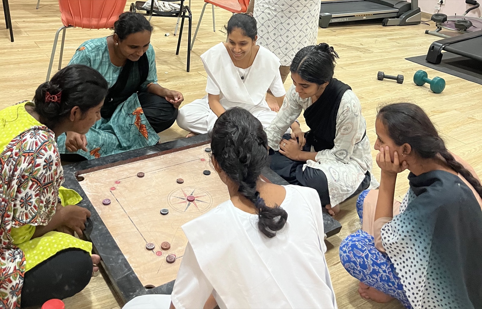 Nursing students playing carrom