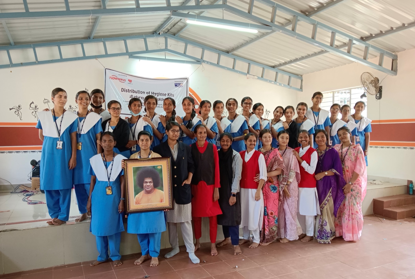 Nursing students and faculty at a hygiene kit distribution during a community posting