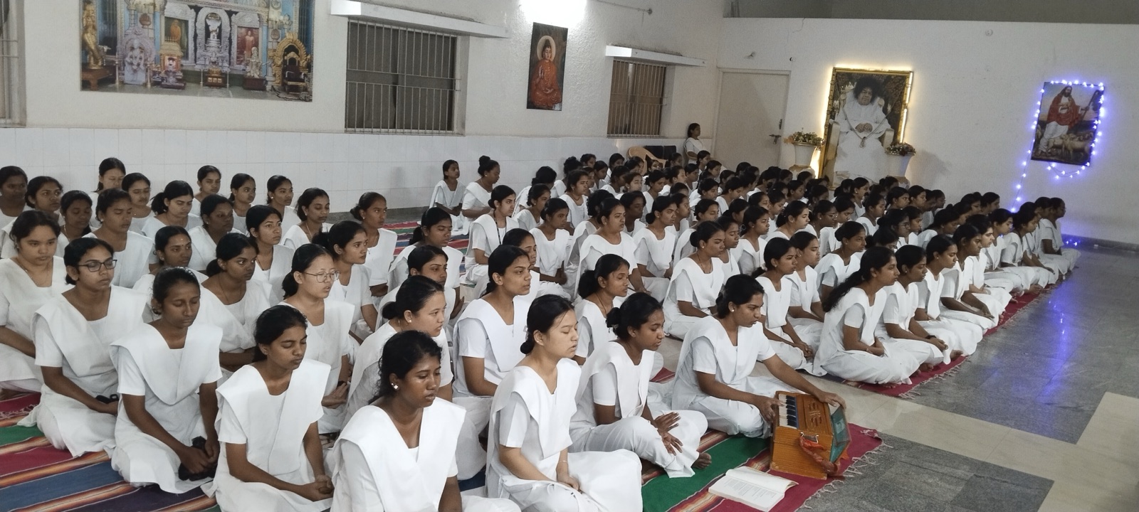Nursing students seated together for Suprabhatam prayers
