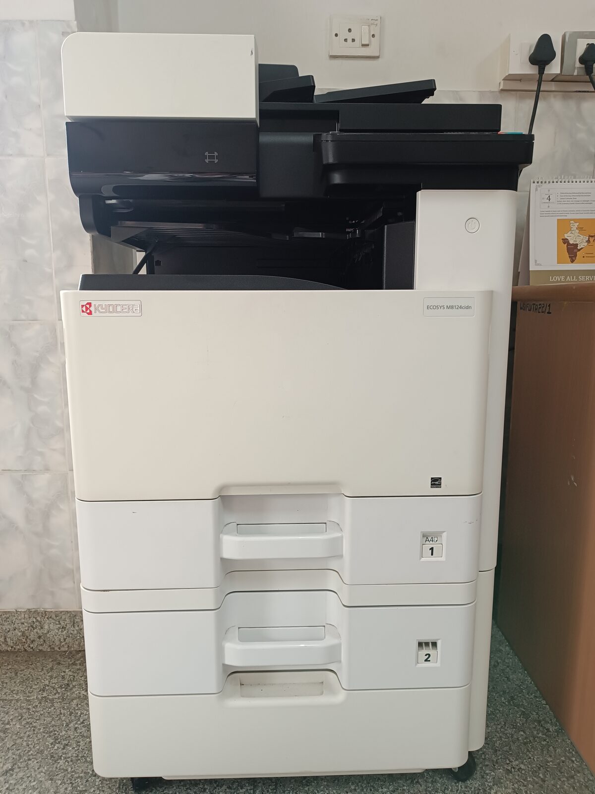 Kyocera ECOSYS M8124cidn multi-function colour printer in the library