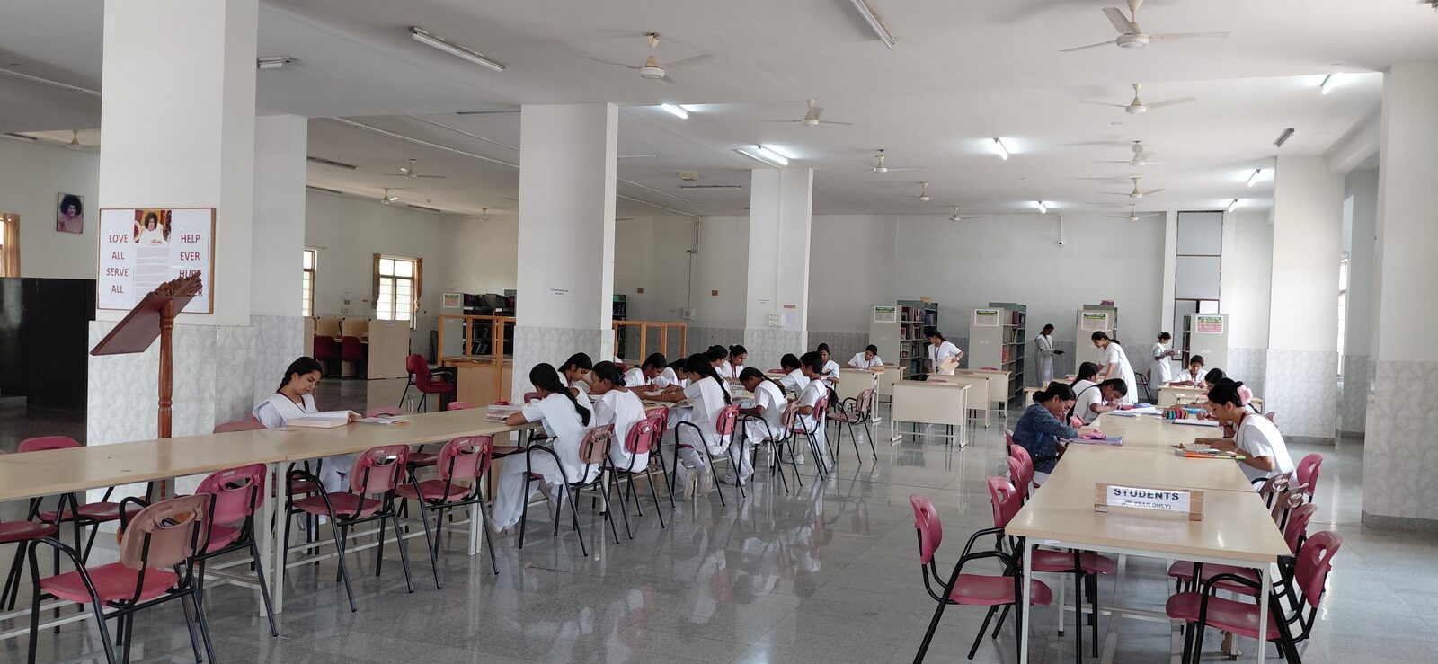 The library reading hall with nursing students at study
