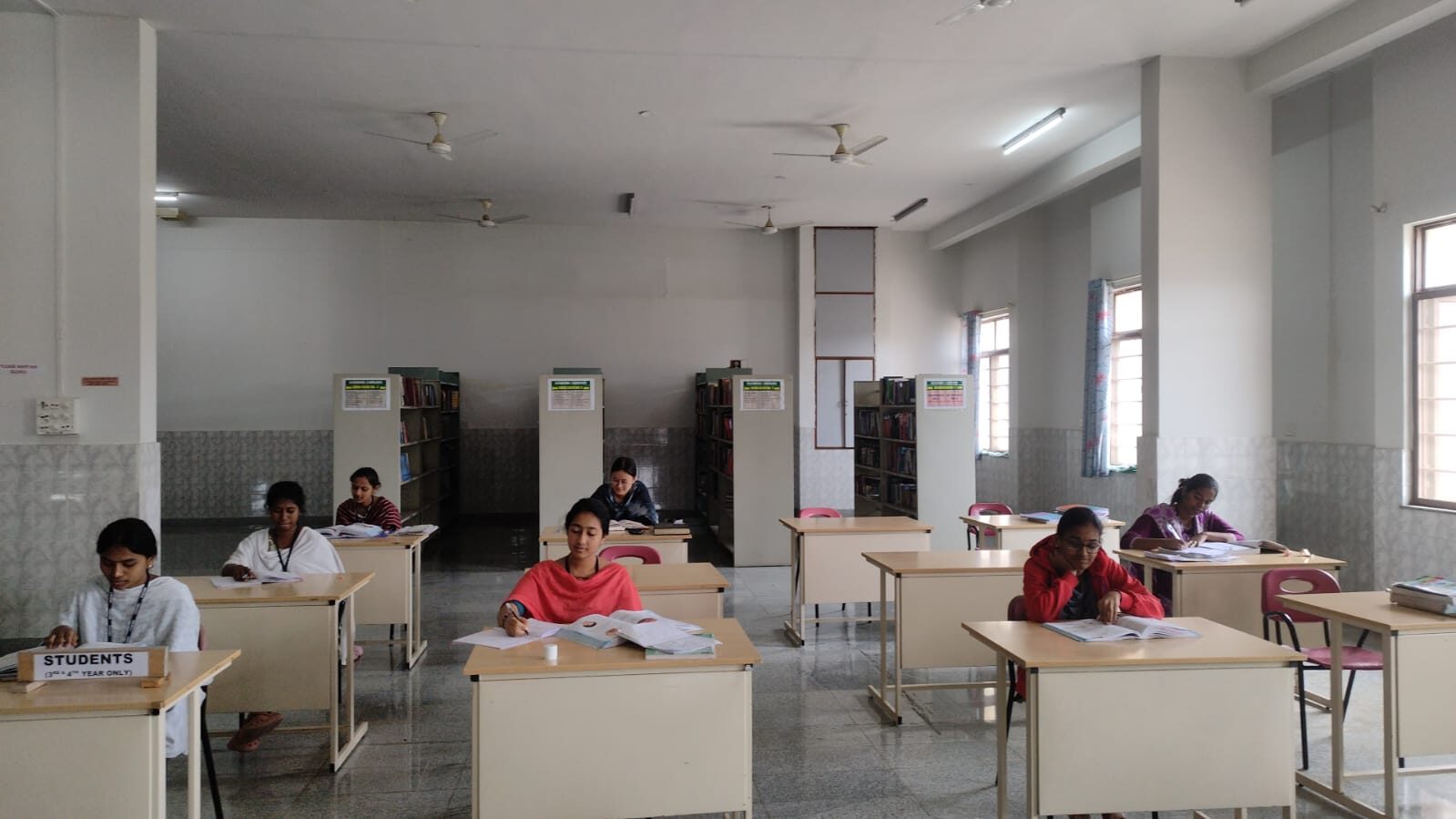 Students reading in the hospital library
